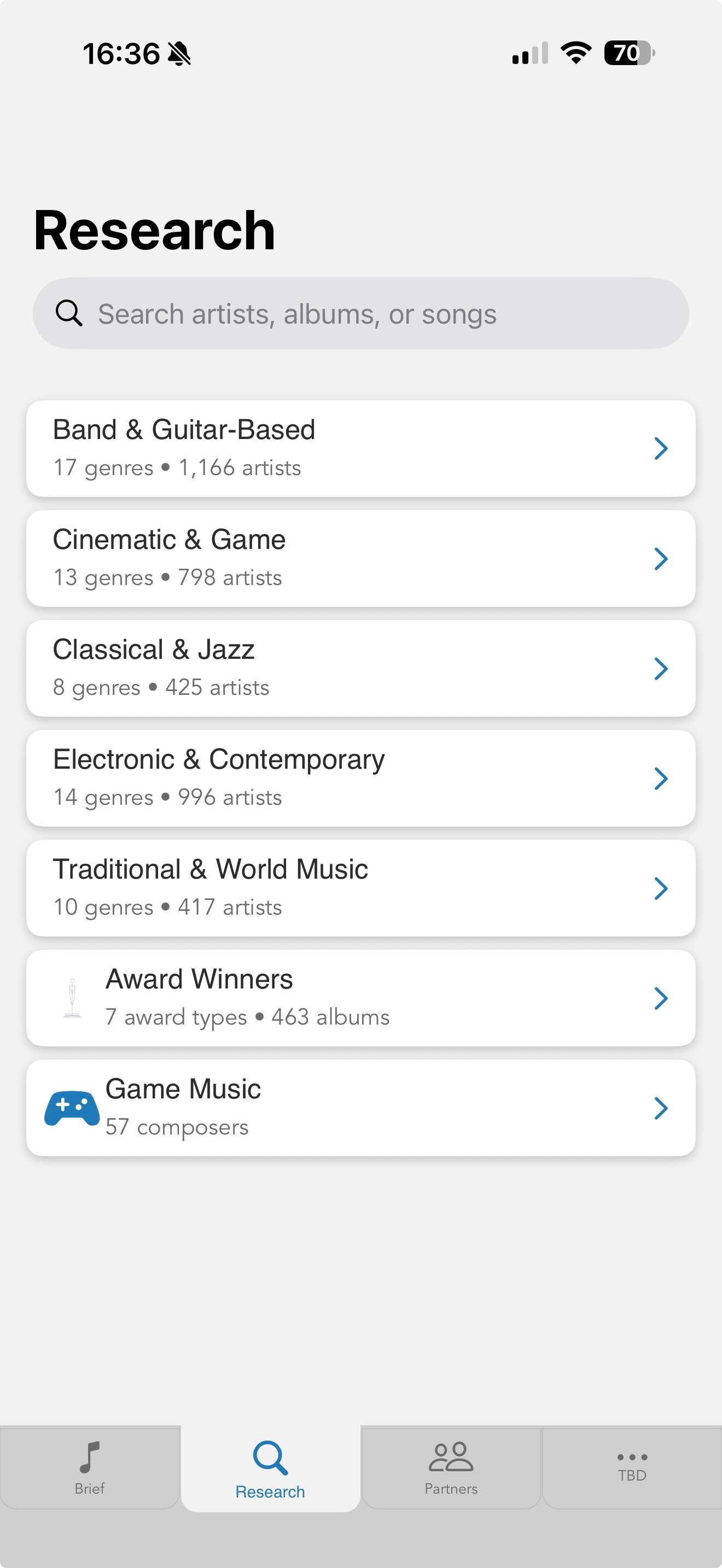 CueMusic research screen showing curated music categories: Band & Guitar-Based, Cinematic & Game, Classical & Jazz, Electronic & Contemporary, Traditional & World Music, Award Winners, Game Music